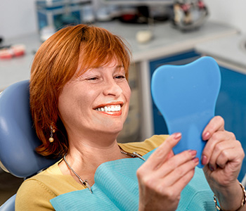 What can a restorative dentist near me in Scarborough do about gum disease?