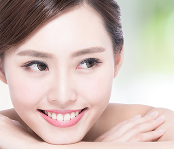 Dr Kosta Adams, Adams Dental Associates Image Of pretty Asian girl
