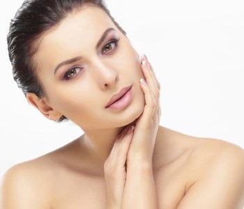 Dr Gerald N. Bock, MD California Skin & Laser Center Woman's hand on her face side look