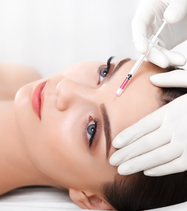 Beautiful woman gets injections.