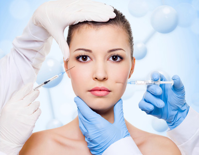 Injection of botox in beautiful woman face