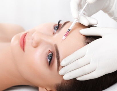 Beautiful woman gets injections