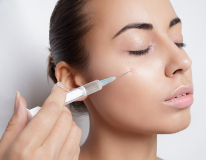 Woman getting cosmetic injection