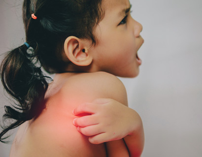 Young Girl Scratching Her Itchy Back