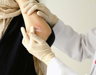 Dermatologist doctor doing treatment