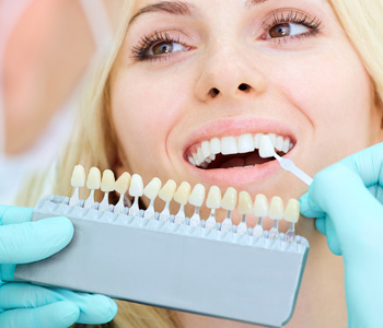 A girl with beautiful smile at the dentist