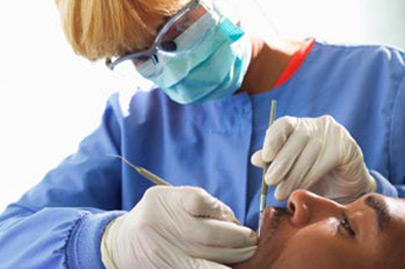 Dolton, IL area dentist offers treatment for gum disease