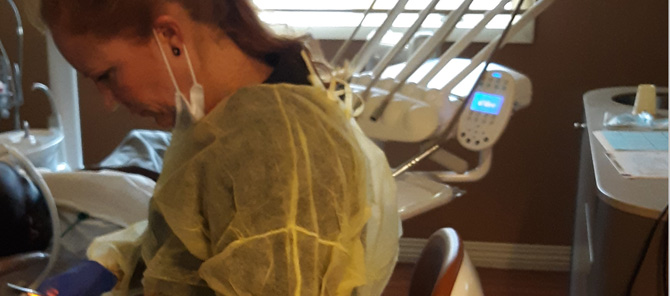 Dr. Enright examinig a patient