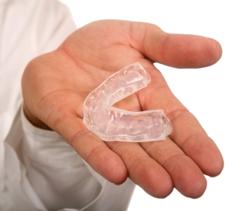 Dentist in greensboro recommends using mouth guards for young athletes