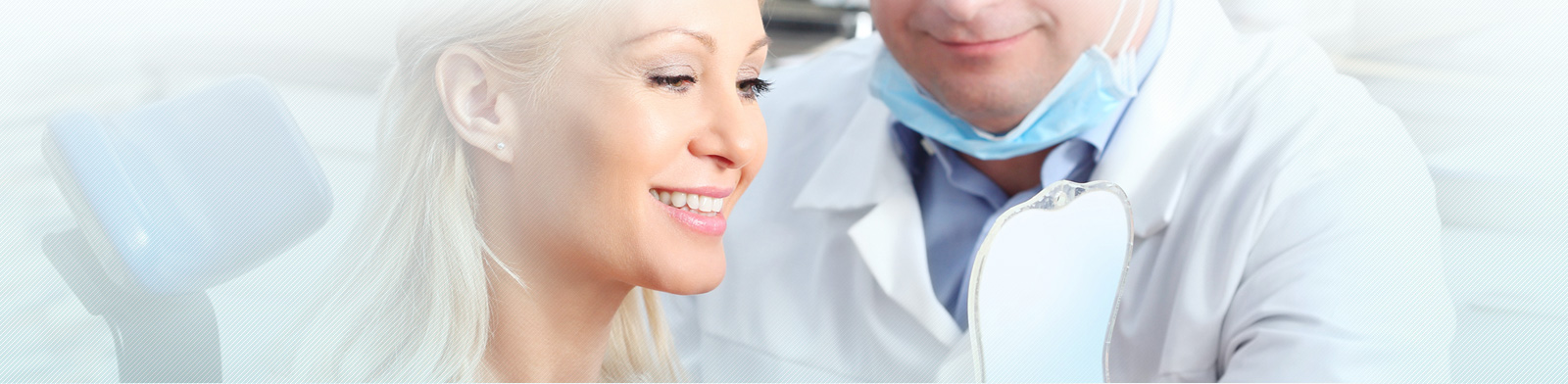 Woman sitting at the dentist and checking tooth
