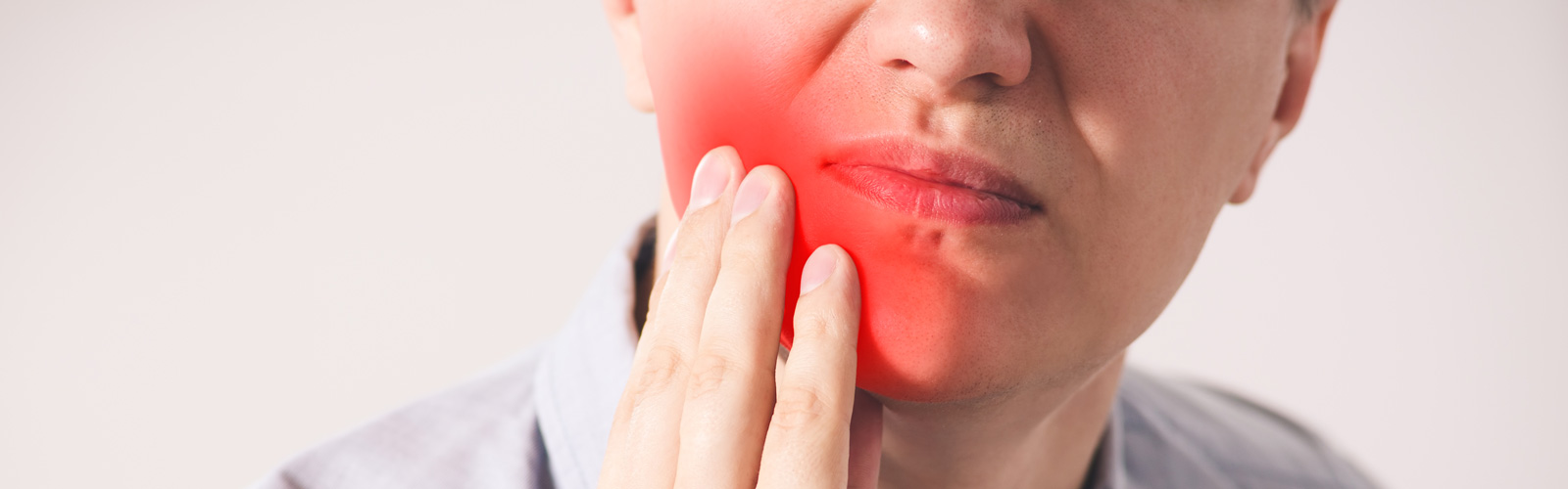 A woman having toothache