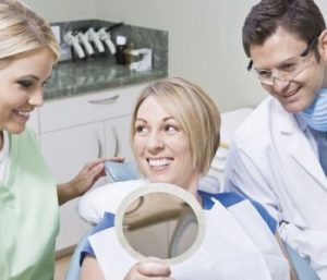 Dentist in West Palm Beach area reviews the benefits of dental implants and expected cost