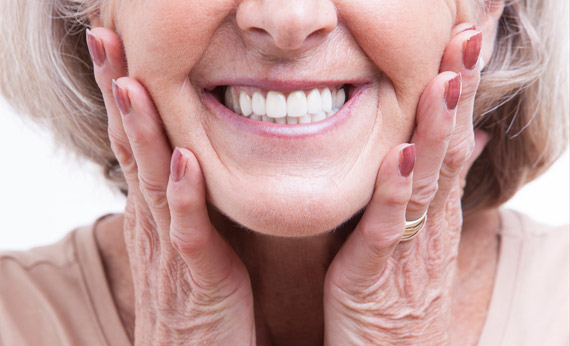 Old woman wearing dentures