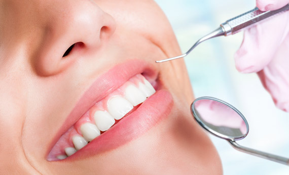 Teeth with hatchet and mouth mirror