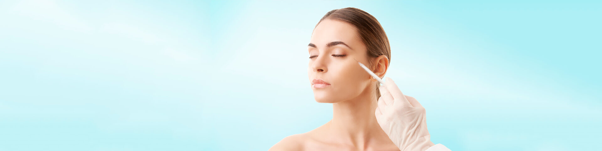 Portrait of an attractive young woman receiving botox treatment
