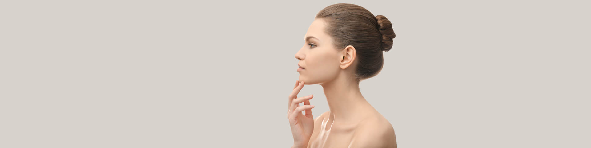 Young beautiful woman depicting plastic surgery concept
