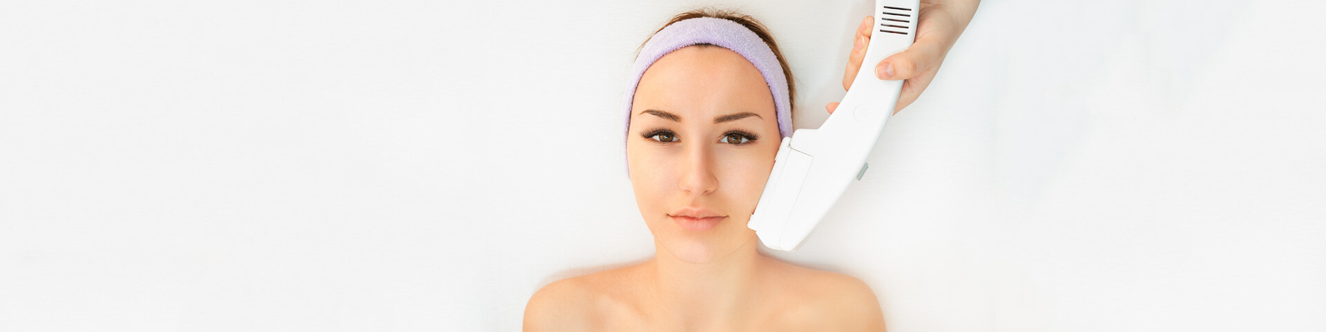 Young woman receiving laser treatment