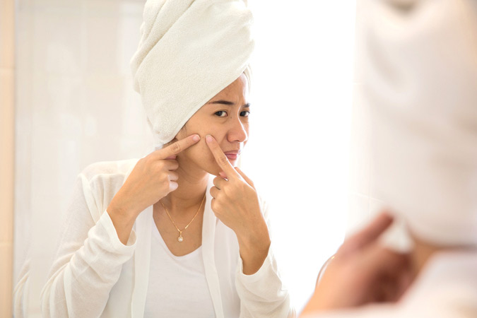 Damascus, MD area dermatologist reviews microneedling device skin needling