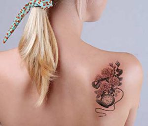Woman with tattoo on her back