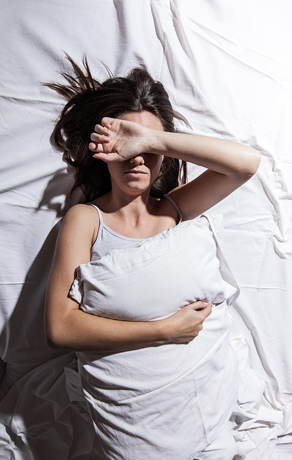 A Woman Having Trouble with Sleeping because of Sleep Apnea