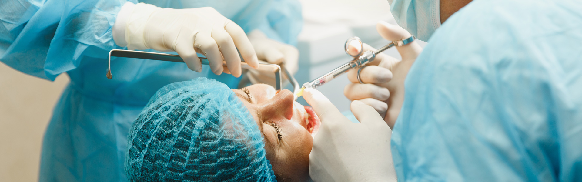 Male professional dentist, surgeon in uniform