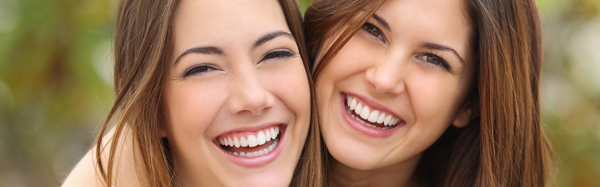 Two female friends laughing