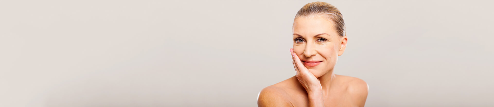 Modern woman with hand on her face