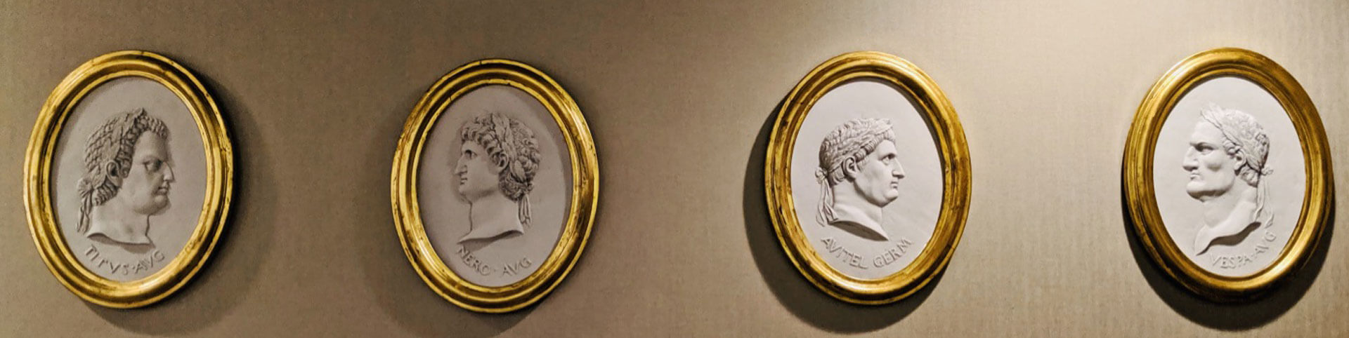 Sculptures of Roman Emperors hanged on a wall