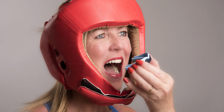 Female boxer with mouthguard