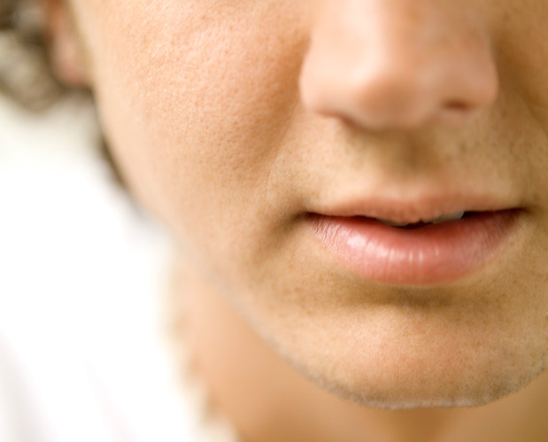 Close-up of a young man's nose and mouth