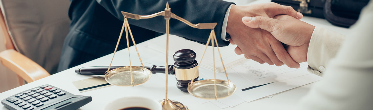 lawyer and client shaking hands