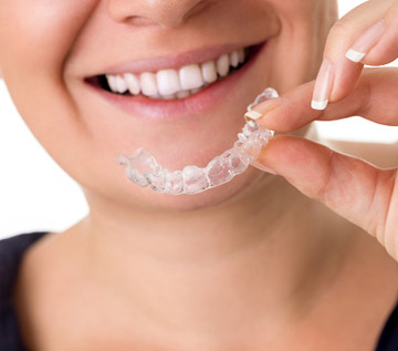 Dentist Treating a Young Woman