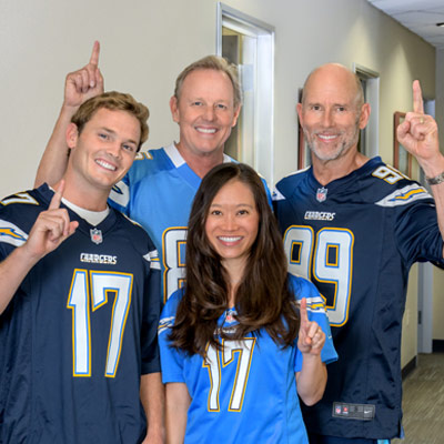 Thomas J. Rolfes, DDS, Christina T. Do, DDS, Dr. Cary J. Dunne DDS & Dr. Timothy J. Rolfes supporting LA Chargers-01