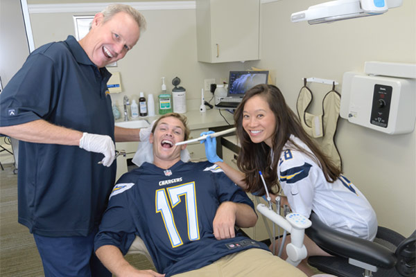SMILE4OC Doctors with LA Chargers Uniform